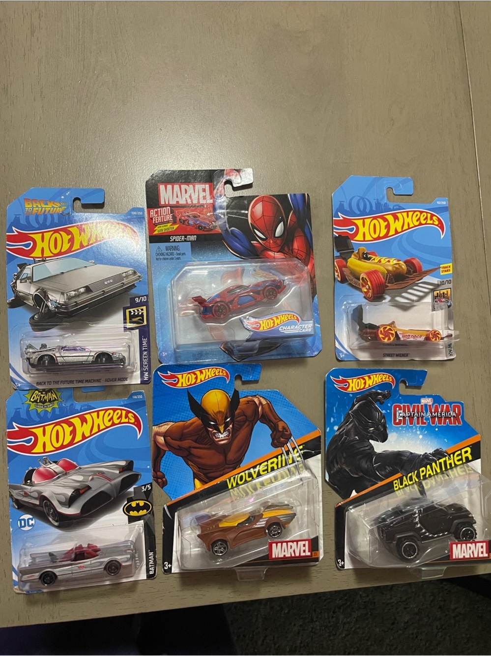 Hot Wheels Marvel Character Cars - Assorted Red, Yellow & Black Vehicles